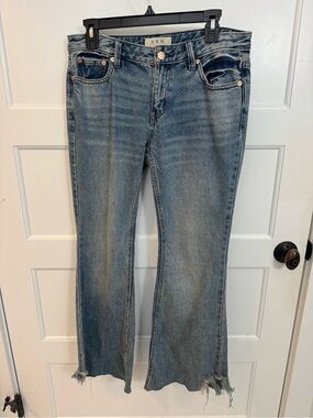 We The Free Faded Blue Bootcut Jeans with Raw Hem